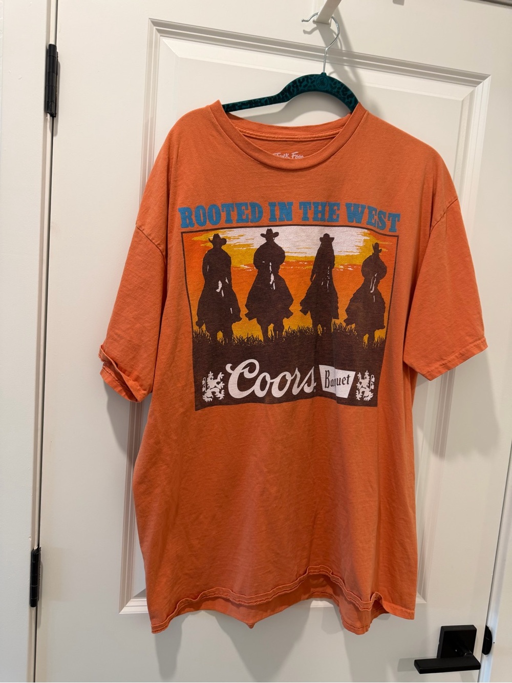Buckle graphic tee Coors Banquet 'Rooted in the West' Orange Graphic Tee